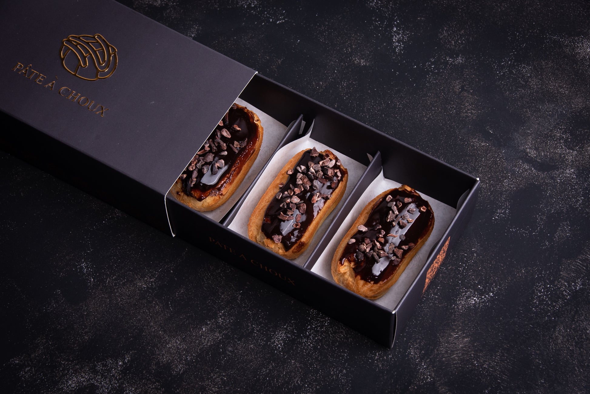 A box of Espresso Mini Éclair.